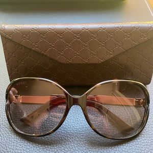 GUCCI sunglasses.